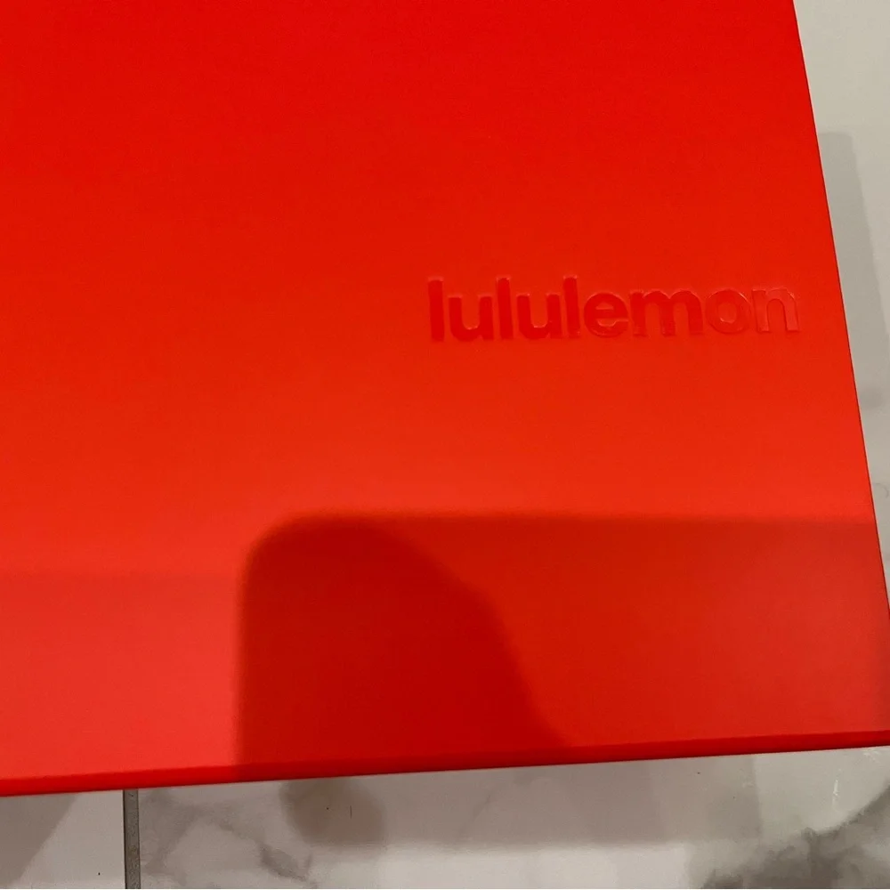 Lululemon — Vibrant Orange Decorative Gift Box.